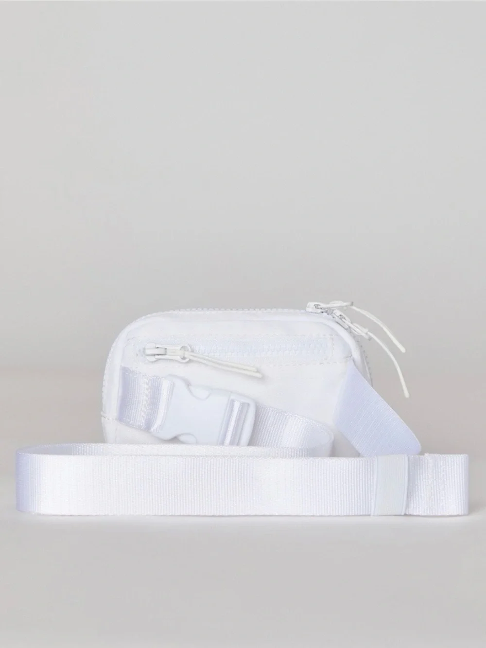 Fabletics mini belt bag in classic white